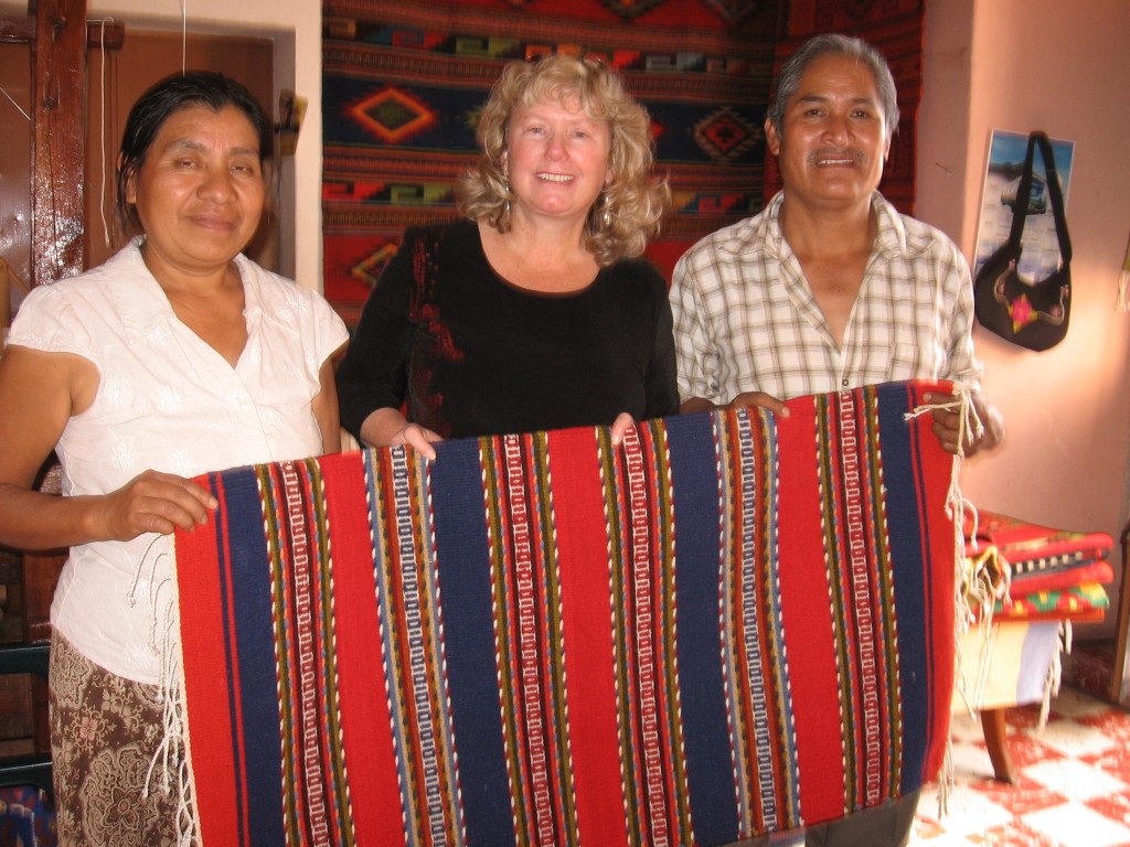 Marian Hubler buys a carpet in Oaxaca.